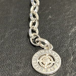 Thomas Sabo Sterling Silver bracelet with white diamonds & filigree branding.